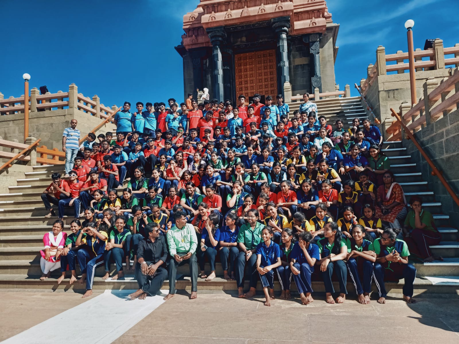 Students on an educational tour posing at a heritage monument, Annai Velankanni School, Coimbatore