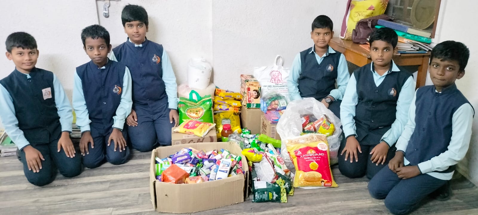 Students collecting essentials for a donation drive at Annai Velankanni School, Coimbatore